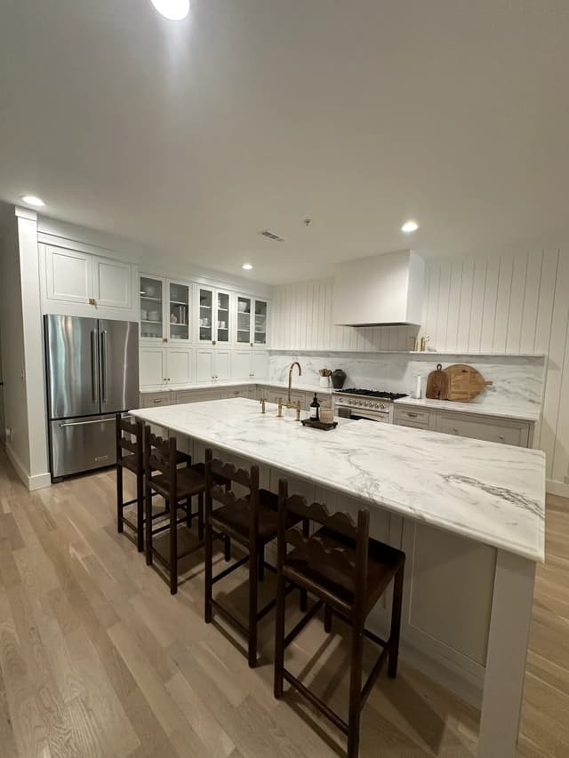 Wide view of the Coastal Chic kitchen and gathering island