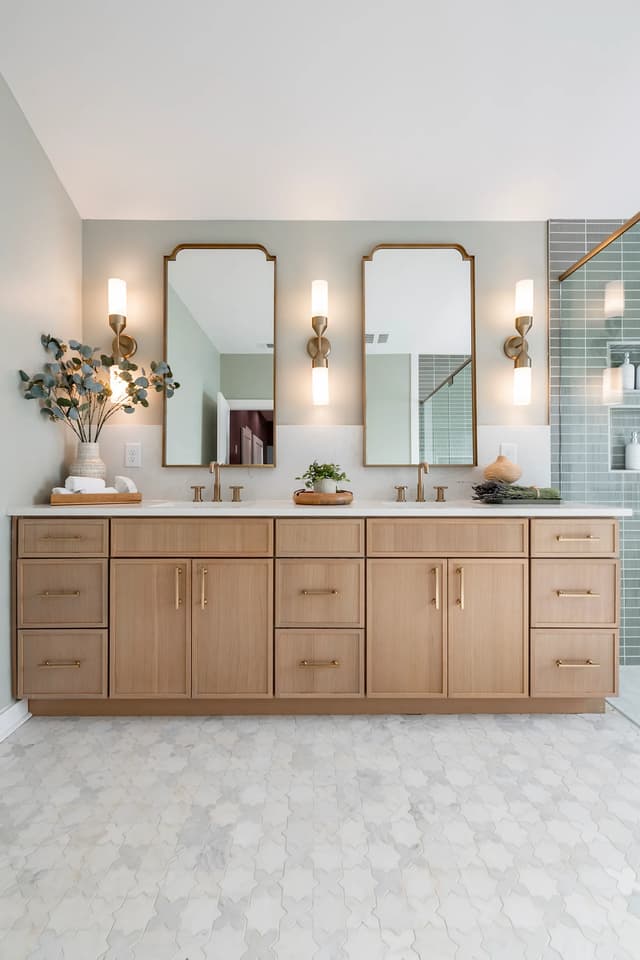 Spa-like oak bathroom cabinetry and double vanity